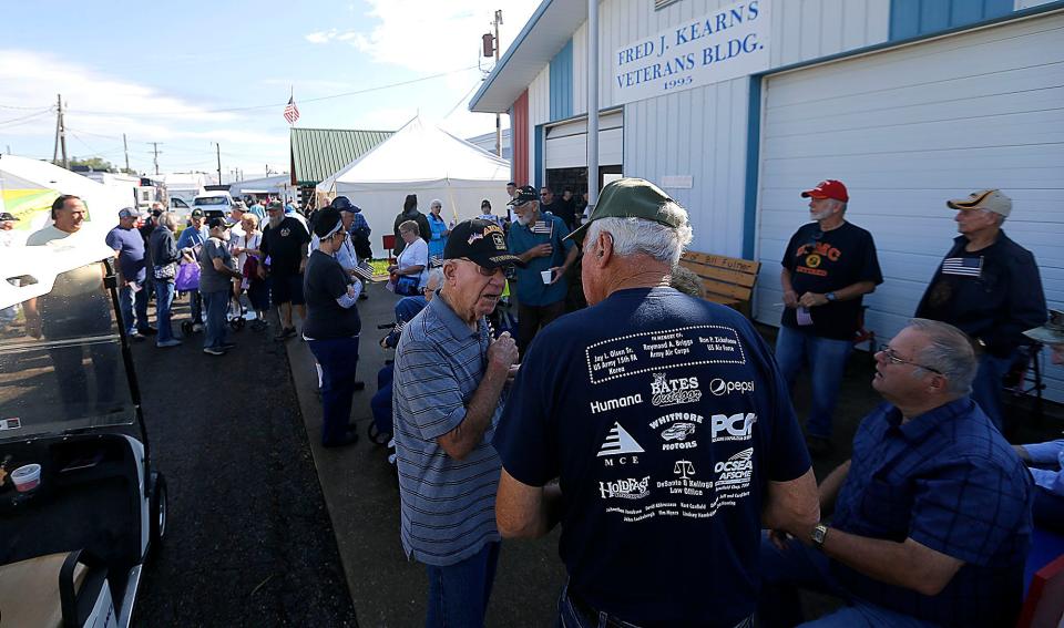 Veterans gather at the Ashland County Fairgrounds before the Walk of Honor Monday, Sept. 19, 2022.