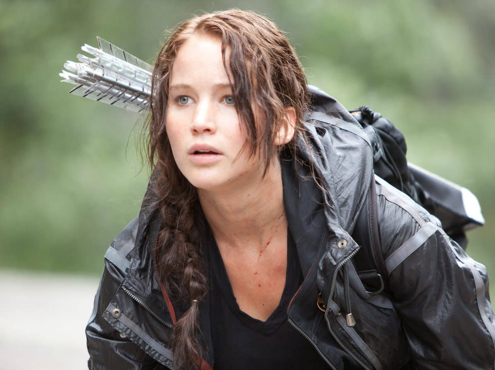 Jennifer Lawrence kämpft in "Die Tribute von Panem" ums Überleben. (Bild: imago images/Everett Collection)