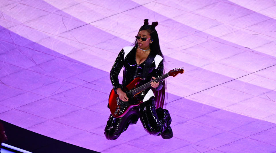 Singer H.E.R. performs during the Apple Music Halftime Show of Super Bowl LVIII between at Allegiant Stadium in Las Vegas on February 11, 2024. / Credit: PATRICK T. FALLON/AFP via Getty Images