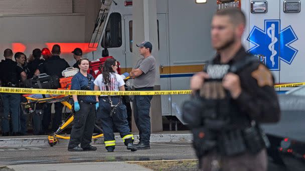 PHOTO: Emergency personnel gather after a shooting at Greenwood Park Mall in Greenwood, Ind., July 17, 2022. (Kelly Wilkinson/USA Today Network via Reuters)