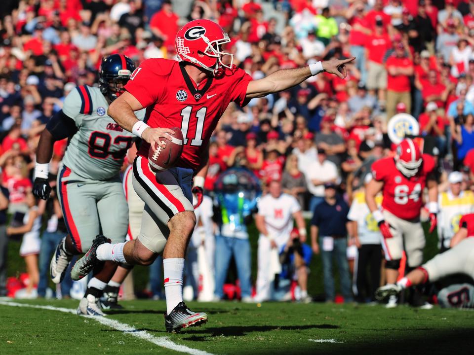 Aaron Murray #11 of the Georgia Bulldogs passes against the Ole Miss Rebels at Sanford Stadium on November 3, 2012 in Athens, Georgia. (Photo by Scott Cunningham/Getty Images)