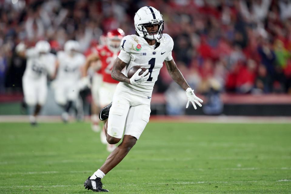 PASADENA, CALIFORNIA - JANUARY 02: KeAndre Lambert-Smith #1 of the Penn State Nittany Lions runs the ball after a catch to score an 88 yard touchdown against the Utah Utes during the fourth quarter in the 2023 Rose Bowl Game at Rose Bowl Stadium on January 02, 2023 in Pasadena, California. (Photo by Sean M. Haffey/Getty Images)