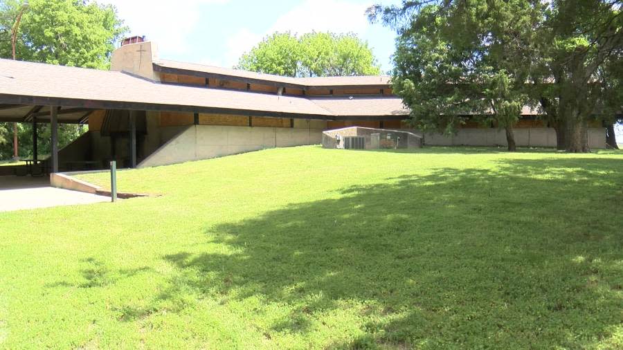 A building at Pawnee Prairie Park in Wichita is boarded up after damage from thieves and vandals. (KSN News Photo)