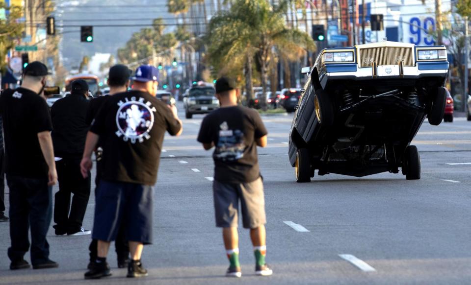 A lowrider shows off during Cruise Night on Van Nuys Boulevard