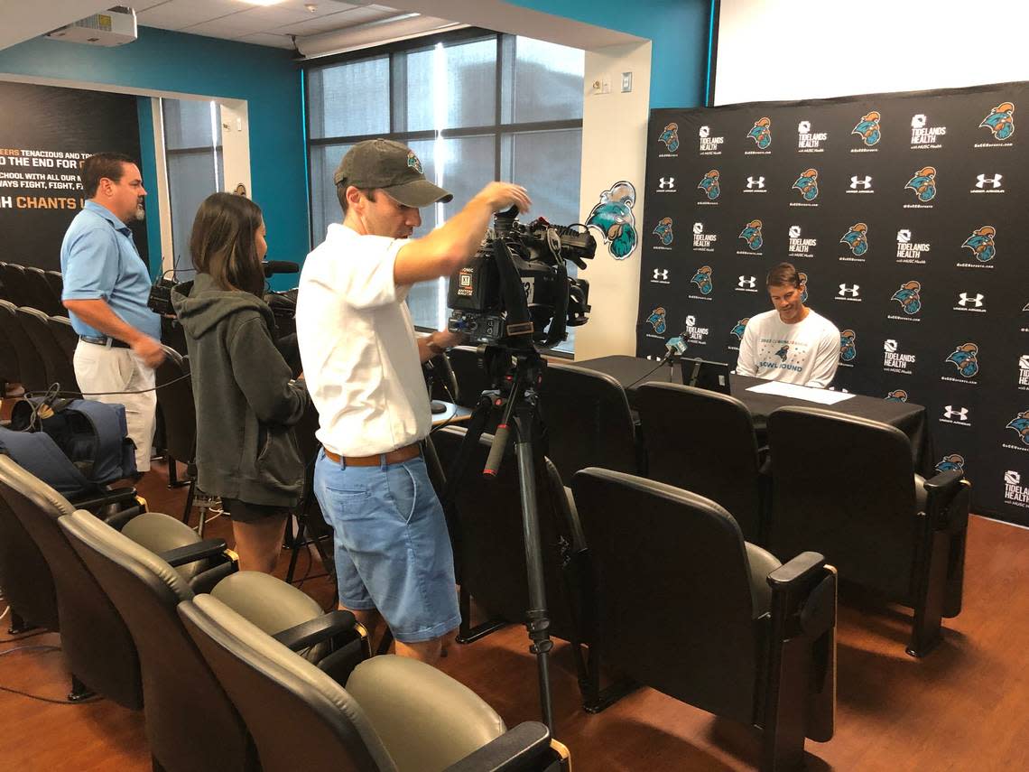 Jamey Chadwell gets situated before his weekly press conference with local reporters on Wednesday ahead of Coastal Carolina’s game against Old Dominion.