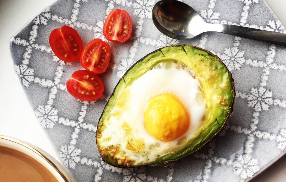 Avocados and eggs are two foods experts say may help ease anxiety. Combine them in avocado egg boats. (Photo: Katarzyna Halat/EyeEm via Getty Images)