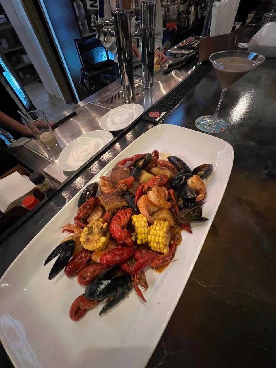 Try the Shrimp Mussels and Crawfish Boil at Krave Restaurant and Bar.