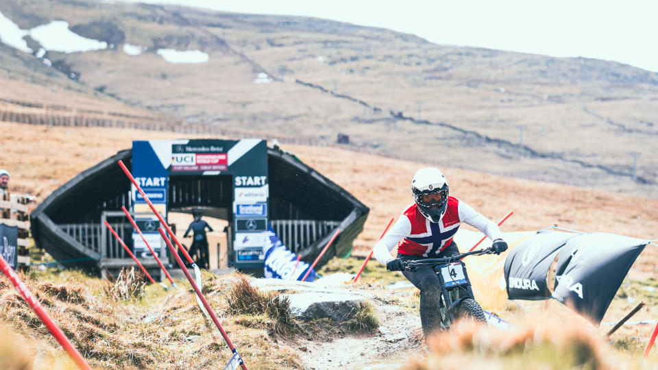 Rider leaving the start gate at the 2022 Downhill World Cup in Fort William