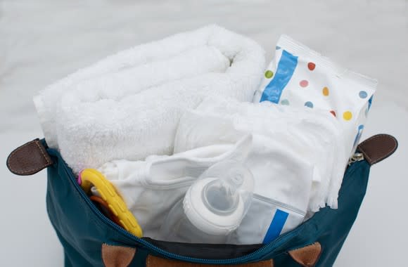 Baby products in a diaper bag.