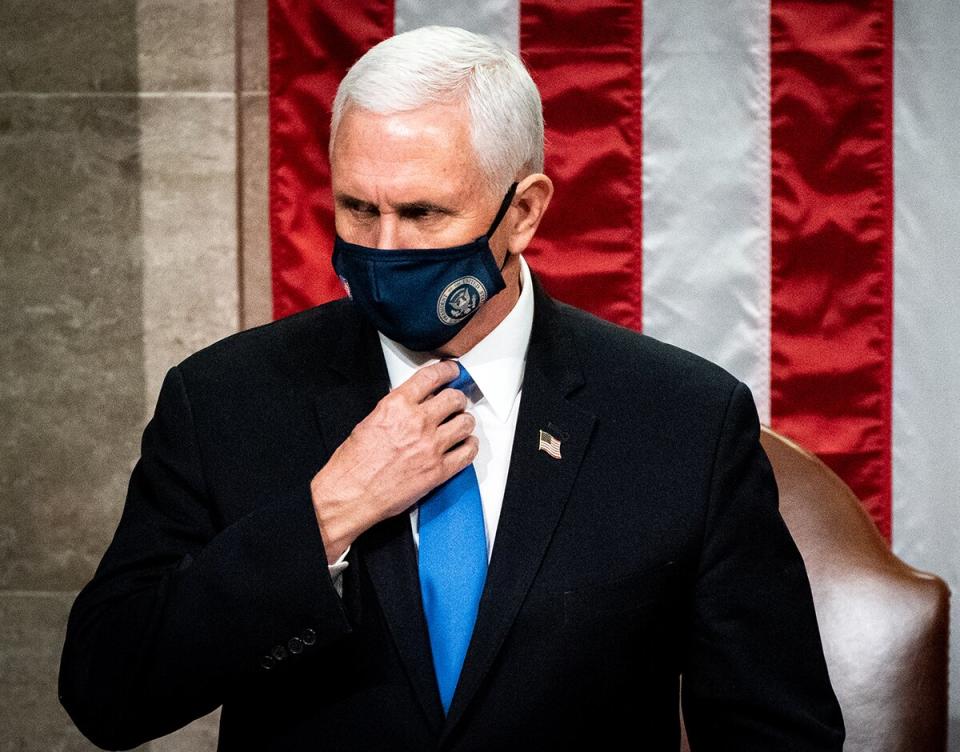 WASHINGTON, DC - JANUARY 06: Vice President Mike Pence presides over a joint session of Congress on January 6, 2021 in Washington, DC. Congress has reconvened to ratify President-elect Joe Biden's 306-232 Electoral College win over President Donald Trump, hours after a pro-Trump mob broke into the U.S. Capitol and disrupted proceedings.