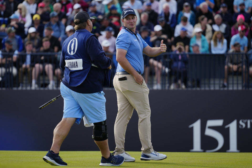 FILE - Austria's Sepp Straka reacts after after making a birdie putt on the 17th green during the second day of the British Open Golf Championships at the Royal Liverpool Golf Club in Hoylake, England, on July 21, 2023. Straka changed caddies in July and will be playing in his first Ryder Cup next week in Italy. (AP Photo/Jon Super, File)