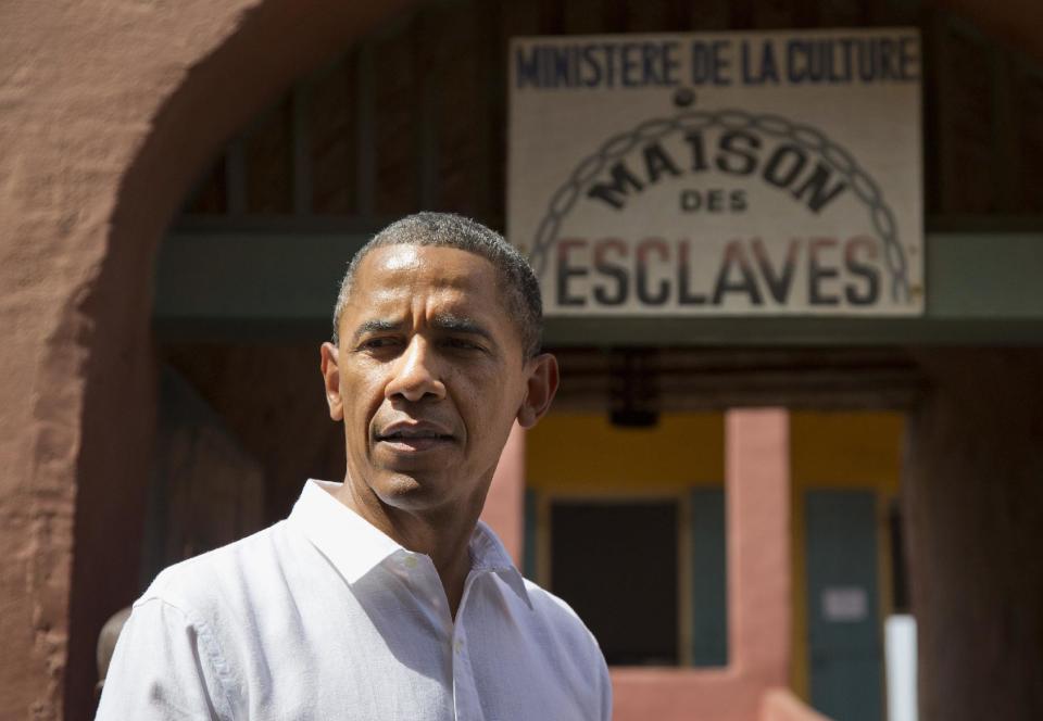 President Barack Obama pauses during a statement after taking a tour of Goree Island, Thursday, June 27, 2013, in Goree Island, Senegal. Goree Island is the site of the former slave house and embarkation point built by the Dutch in 1776, from which slaves were brought to the Americas. (AP Photo/Evan Vucci)