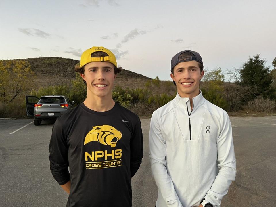 Distant runners Lex, left, and Leo Young of Newbury Park High pose for a photo.