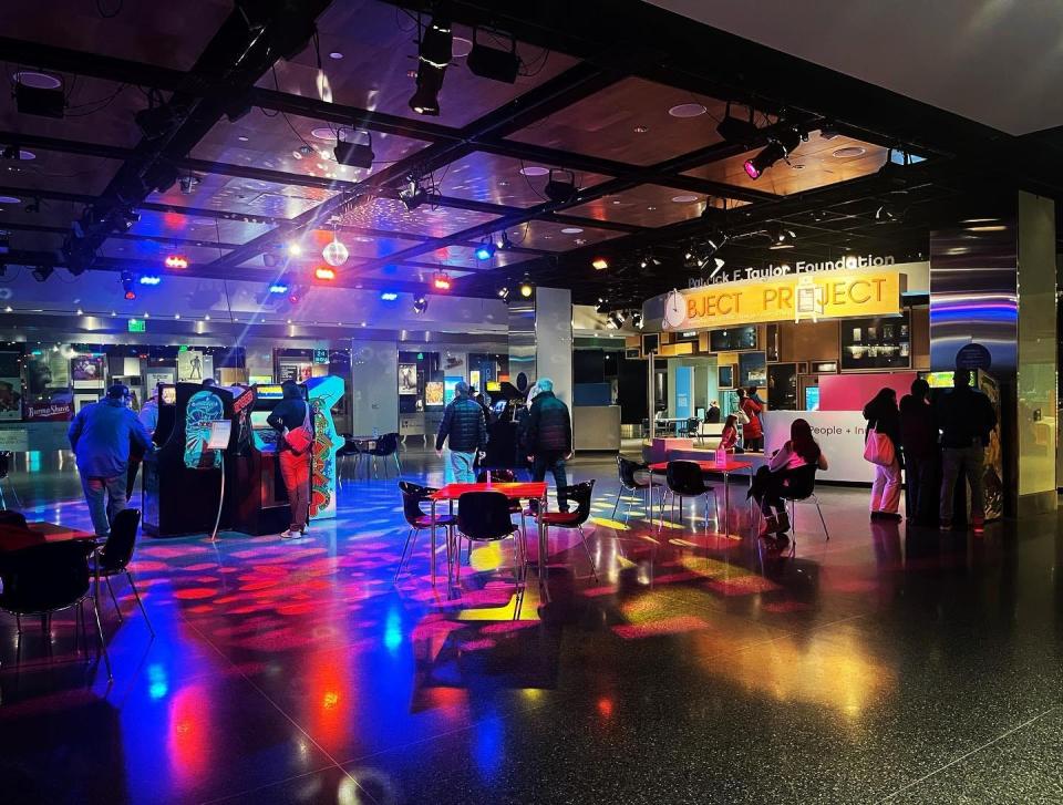 People play arcade games at the Smithsonian's new Entertainment Nation exhibit during its opening weekend. The games were loaned to the “Pause & Replay” section of the exhibit by Timeline Arcade, located in Downtown York.