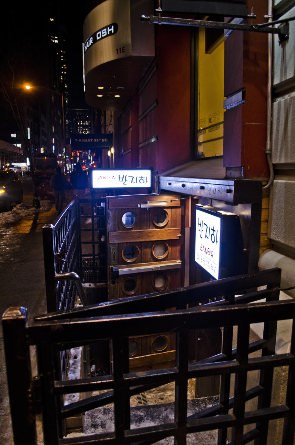 The below-street-level entrance for Bangia, a raucous Korean bar and restaurant popular among the Seoul hipster set.