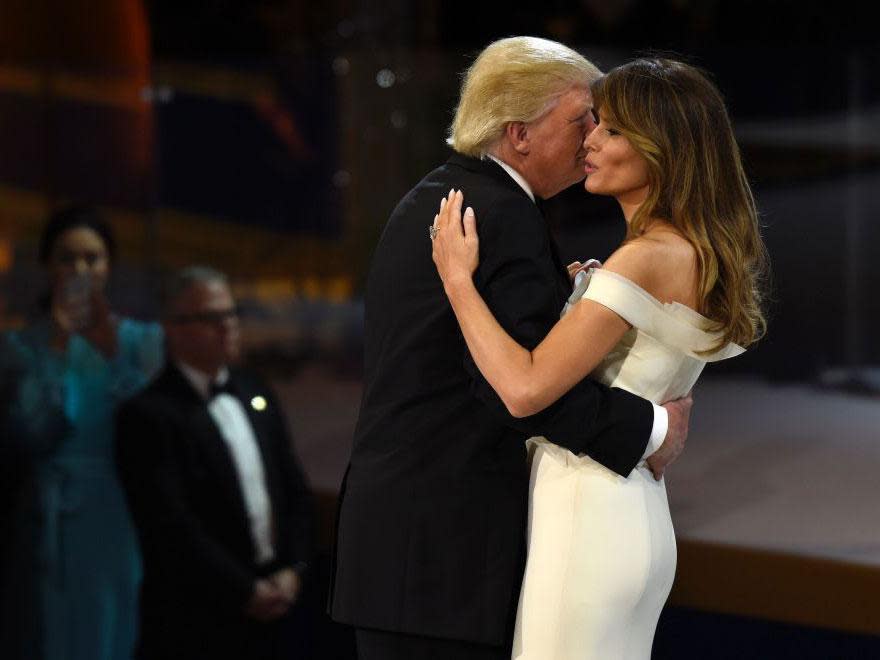 Body language experts say the way Donald and Melania Trump interact, such as during their dance at the inaugural ball, reveals much about their relationship: SAUL LOEB/AFP/Getty Images