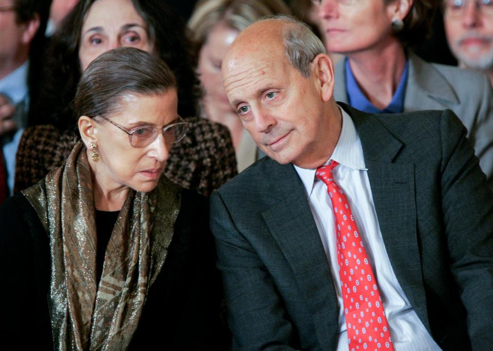 Supreme Court Associate Justices Ruth Bader Ginsburg, left, and Stephen Breyer talk prior to a ceremonial swearing-in ceremony for new Supreme Court Justice Samuel Alito in the East Room of the White House, Feb. 1, 2006.