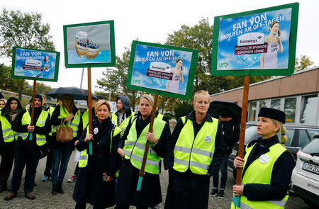 Flight attendants of Lufthansa's budget airline Eurowings take part in a 24-hour strike over pay and working conditions at Cologne-Bonn airport, Germany October 27, 2016. REUTERS/Wolfgang Rattay