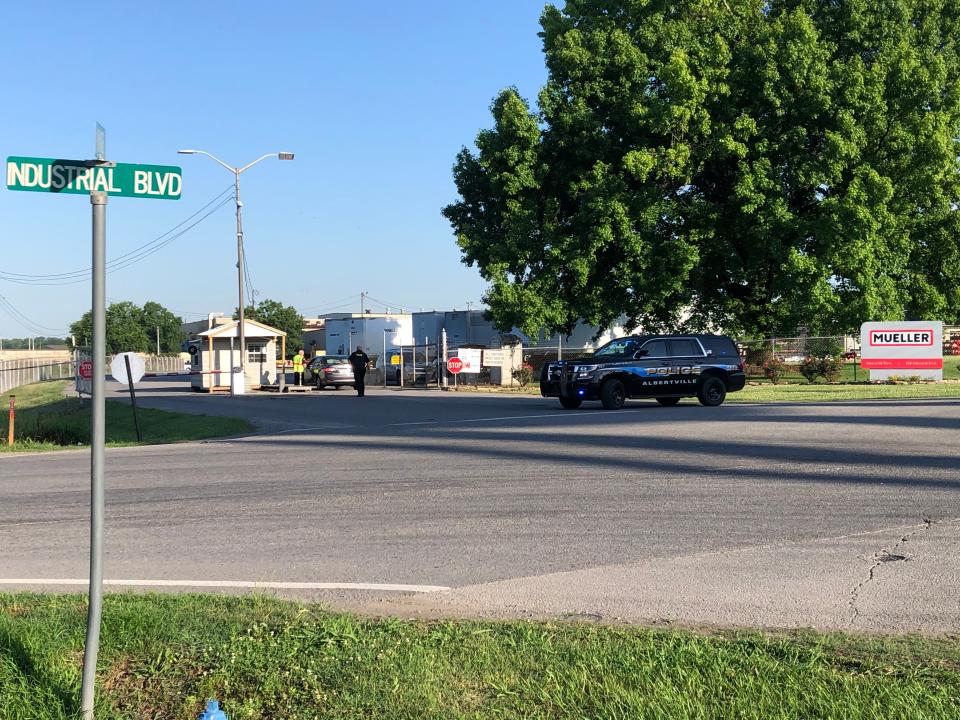 Police blocked access to the Mueller plant Tuesday morning, after two employees were killed and two seriously injured, shot by a fellow employee.