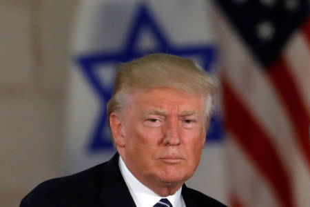 U.S. President Donald Trump, near an Israeli flag at the Israel Museum in Jerusalem May 23, 2017. REUTERS/Ronen Zvulun