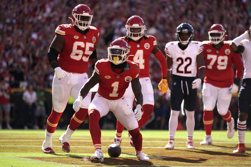 Kansas City Chiefs running back Jerick McKinnon (1) celebrates after scoring during the first half of an NFL football game against the Chicago Bears Sunday, Sept. 24, 2023, in Kansas City, Mo. (AP Photo/Charlie Riedel)