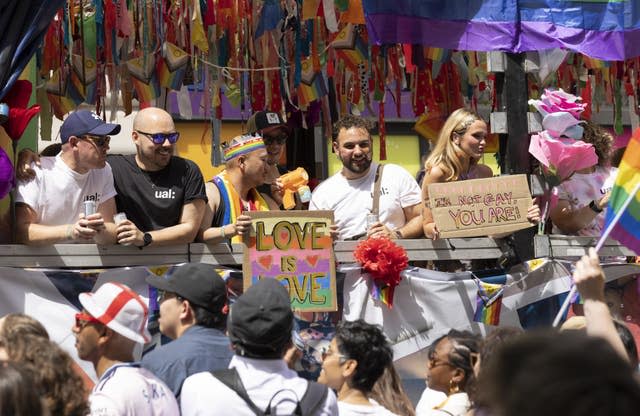 People take part in the Pride in London parade