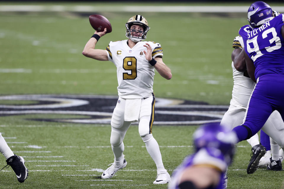 New Orleans Saints quarterback Drew Brees (9) passes in the first half of an NFL football game against the Minnesota Vikings in New Orleans, Friday, Dec. 25, 2020. (AP Photo/Butch Dill)