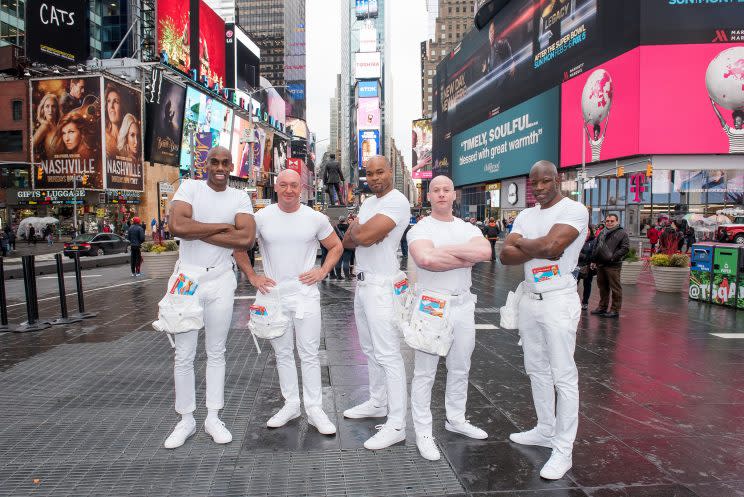 Winner of the the #NextMrClean contest Mike Jackson (C) and the Mr. Clean Sexy Dream Team celebrate Mr. Clean's first ever Super Bowl ad spot in Times Square. (Photo: Mike Pont/WireImage)