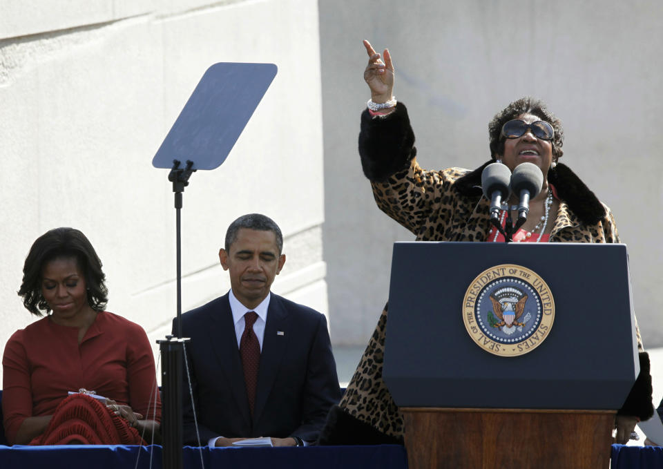 FILE - In this Oct. 16, 2011 file photo, Aretha Franklin sings before President Barack Obama speaks during the dedication of the Martin Luther King Jr. Memorial in Washington. Franklin died Thursday, Aug. 16, 2018, at her home in Detroit. She was 76. Throughout Franklin's career, "The Queen of Soul" often returned to Washington - the nation's capital - for performances that at times put her in line with key moments of U.S. History. (AP Photo/Charles Dharapak, File)