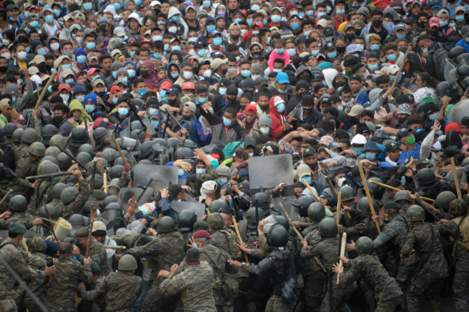 Guatemalan police used sticks and fired tear gas to try to disperse a caravan on Sunday. Source: Getty