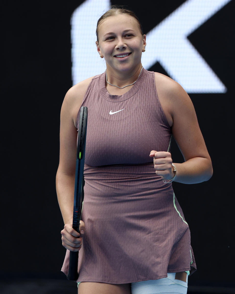 Amanda Anisimova of the U.S. reacts after defeating Liudmila Samsonova of Russia in their first round match at the Australian Open tennis championships at Melbourne Park, Melbourne, Australia, Sunday, Jan. 14, 2024. (AP Photo/Asanka Brendon Ratnayake)