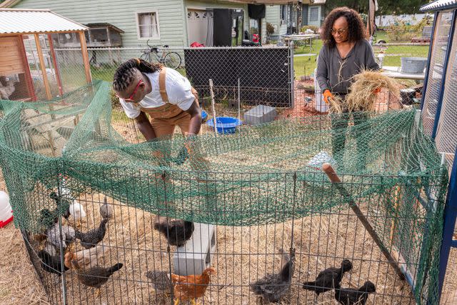 Paprika Southern Matthew and Tia Raiford with their chickens.