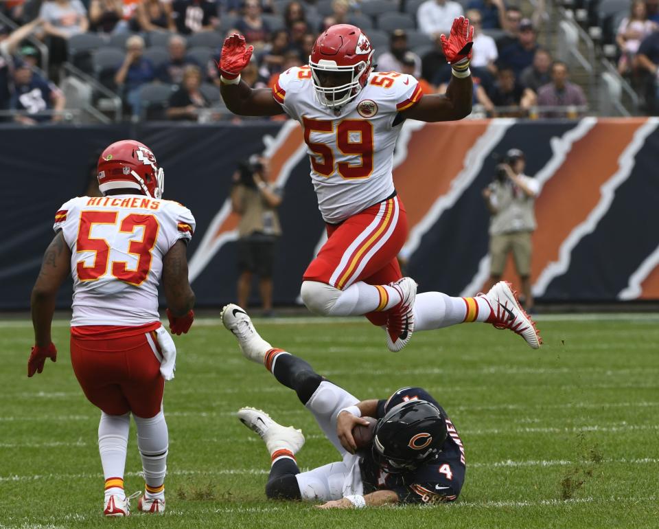 Kansas City Chiefs' Reggie Ragland avoids Chicago Bears' Chase Daniel as he slides after a run during the first half of a preseason NFL football game Saturday, Aug. 25, 2018, in Chicago. (AP Photo/Matt Marton)