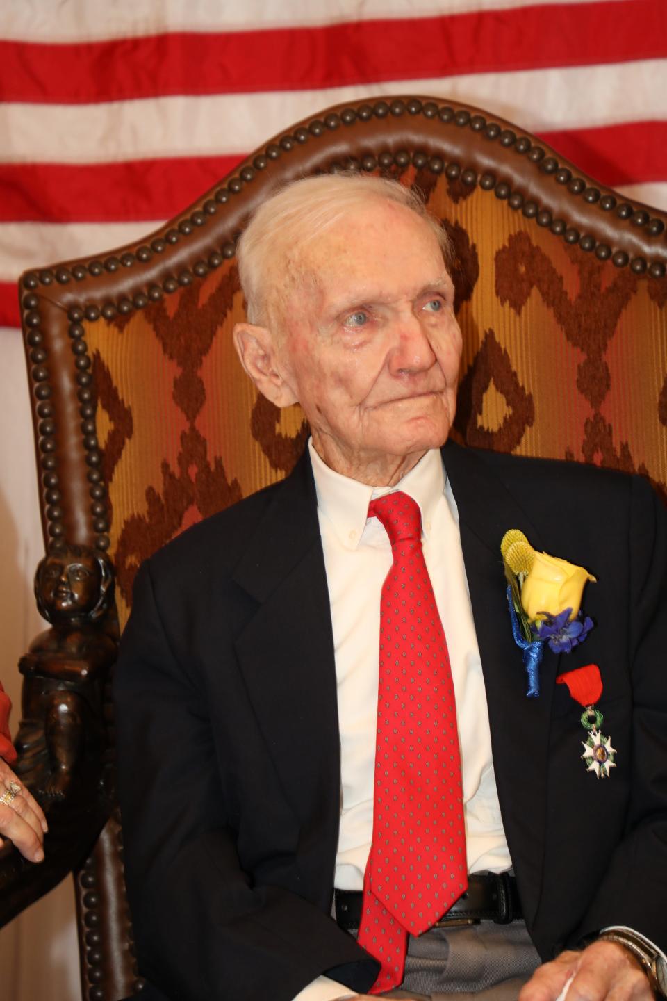 Herbert St. Romain Jr., celebrated his 100th birthday with more than 60 family and friends Sunday at Hotel Bentley. On his jacket, he wears the Legion of Honour which was awarded to him by the French government for his service in World War II. It is the highest French order of merit for military and civil service.
