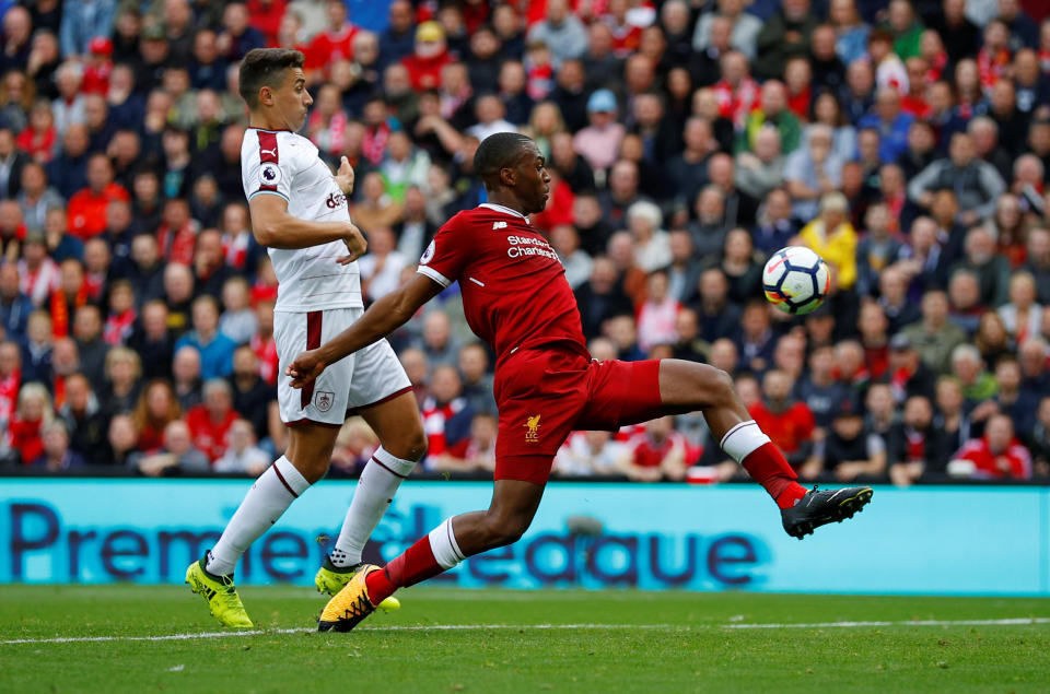 <p>iverpool’s Daniel Sturridge in action with Burnley’s Matthew Lowton REUTERS/Phil Noble </p>