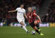 <p>Bournemouth’s Jack Wilshere in action with Swansea City’s Jack Cork </p>