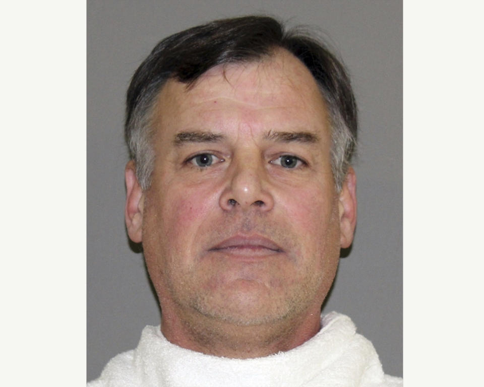 This booking photo provided by the Denton County Jail shows John Wetteland. The former major league pitcher was arrested, Monday, Jan. 14, 2019, in Texas and charged with continuous sex abuse of a child under age 14. Denton County jail records show Wetteland was arrested and freed on $25,000 bond. No attorney was immediately listed to speak for the 52-year-old Wetteland, who lives in Trophy Club, 25 miles northwest of Dallas. (Denton County Jail via AP)