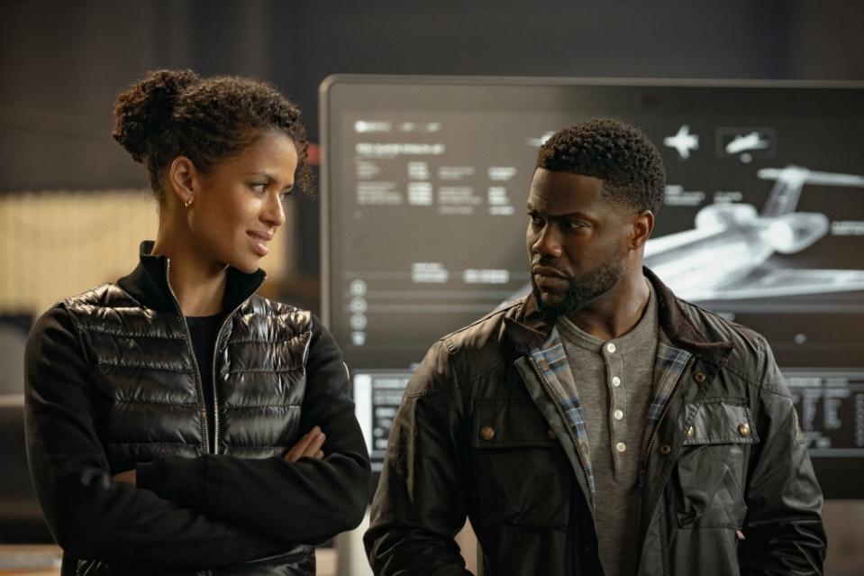 (Left to right) Gugu Mbatha-Raw plays Abby and Kevin Hart is Cyrus in “Lift.” (Photo by Christopher Barr/Netflix © 2023)