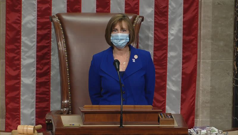 Members of U.S. House of Representatives gather to vote on $484 billion coronavirus relief bill on Capitol Hill in Washington