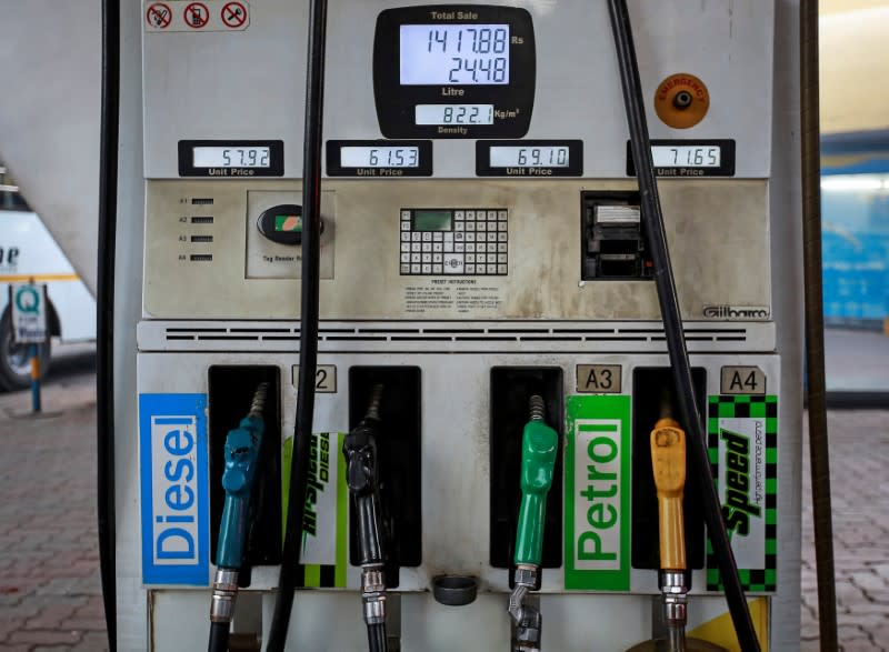 FILE PHOTO: Fuel pumps are seen at a Bharat Petroleum petrol station in Mumbai