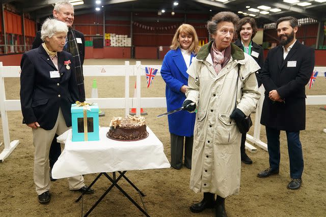 <p>James manning - WPA Pool/Getty Images</p> Princess Anne visits the Wormwood Scrubs Pony Centre on February 8 in London.