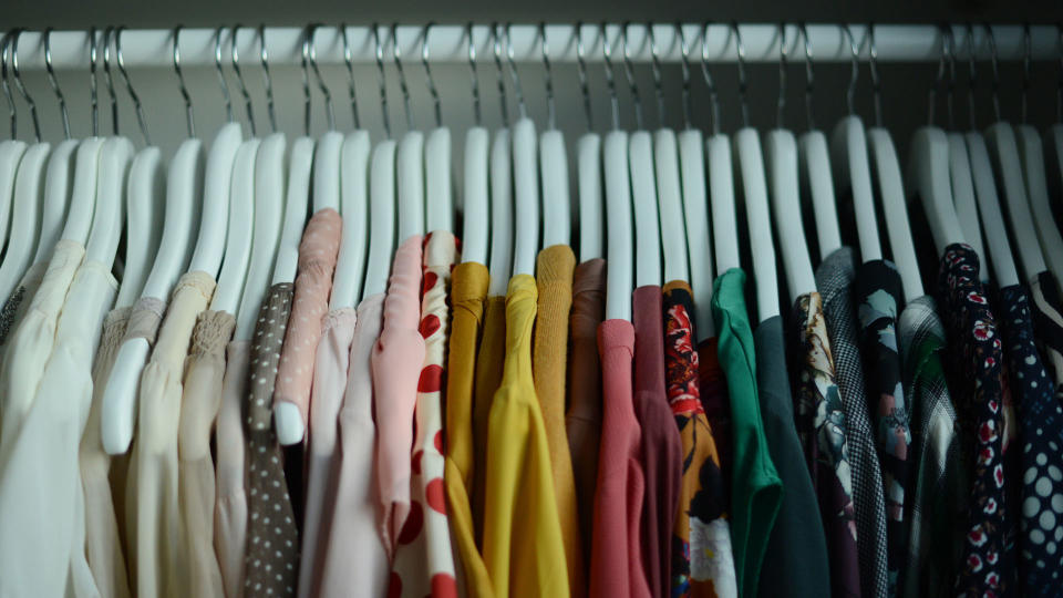 clothes hanging up on a rail