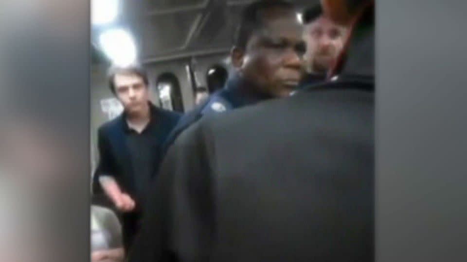 A security guard was racially attacked on a Brisbane train.