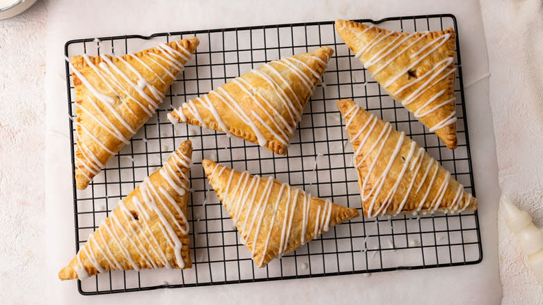 apple turnovers on wire rack