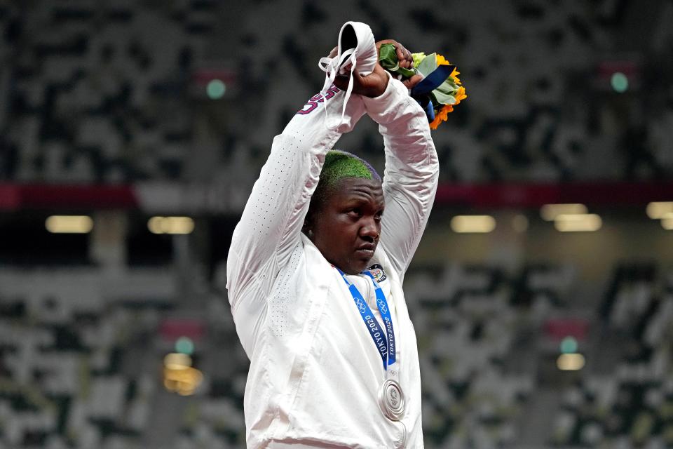 Aug 1, 2021; Tokyo, Japan; Raven Saunders (USA) protests on the medal podium after winning the silver medal in the women's shot put during the Tokyo 2020 Olympic Summer Games at Olympic Stadium.