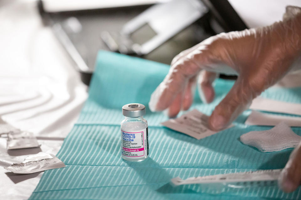 A health care worker prepares a dose of the Moderna COVID-19 vaccine at the Brooklyn Children's Museum vaccination site in New York City on June 23, 2022.<span class="copyright">Michael Nagle—Bloomberg/Getty Images</span>