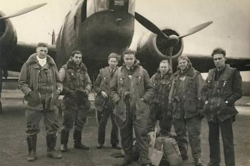 A Bomber Command aircrew pictured during training on a Vickers Wellington in 1942 at RAF Oakington, before they went on to fly on Lancasters.  Among the crew is James D. Snasdell, pictured second from right.