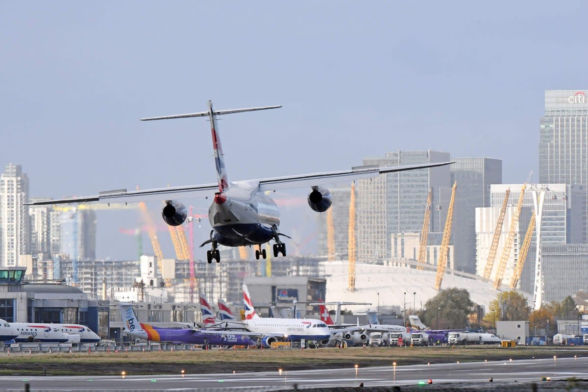 A plane landing at London City Airport (Victoria Jones/PA)