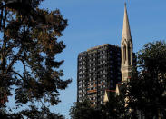 The burnt out remains of the Grenfell apartment tower is seen in North Kensington, London, Britain, September 24, 2017. REUTERS/Eddie Keogh