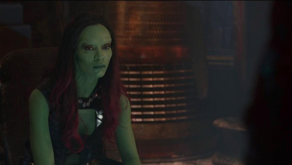 Zoe Saldana's green-skinned Gamora sits n Guardians of the Galaxy